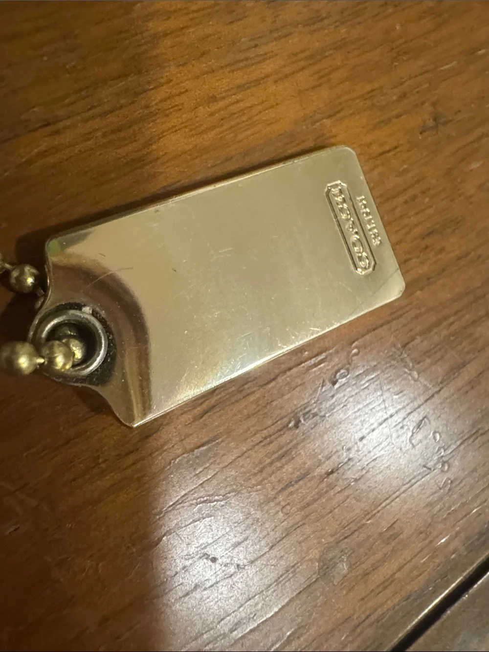 COACH Gold-tone Coach Carriage Tag Charm - Gold